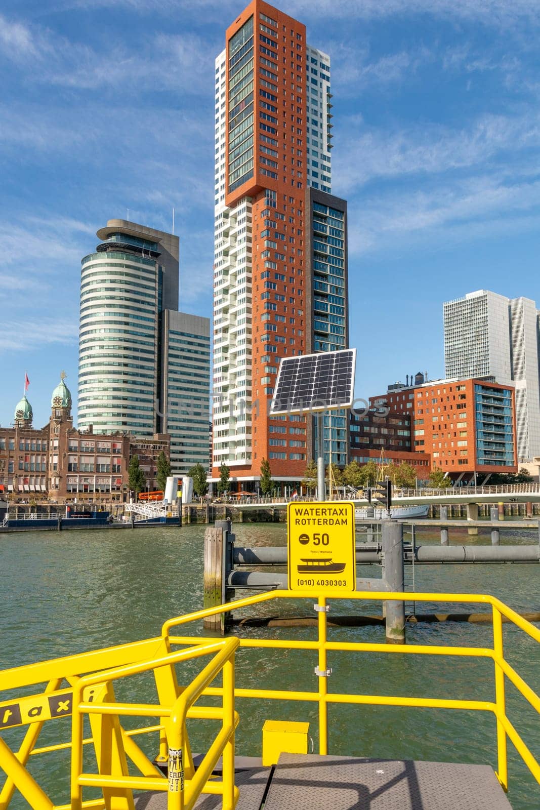 Rotterdam, Netherlands, September 2019: View on the Wilhelminapier with skyscrapers, Landverhuizersplein, Montevideo tower, Rijnhavenbrug and famous hotel New York