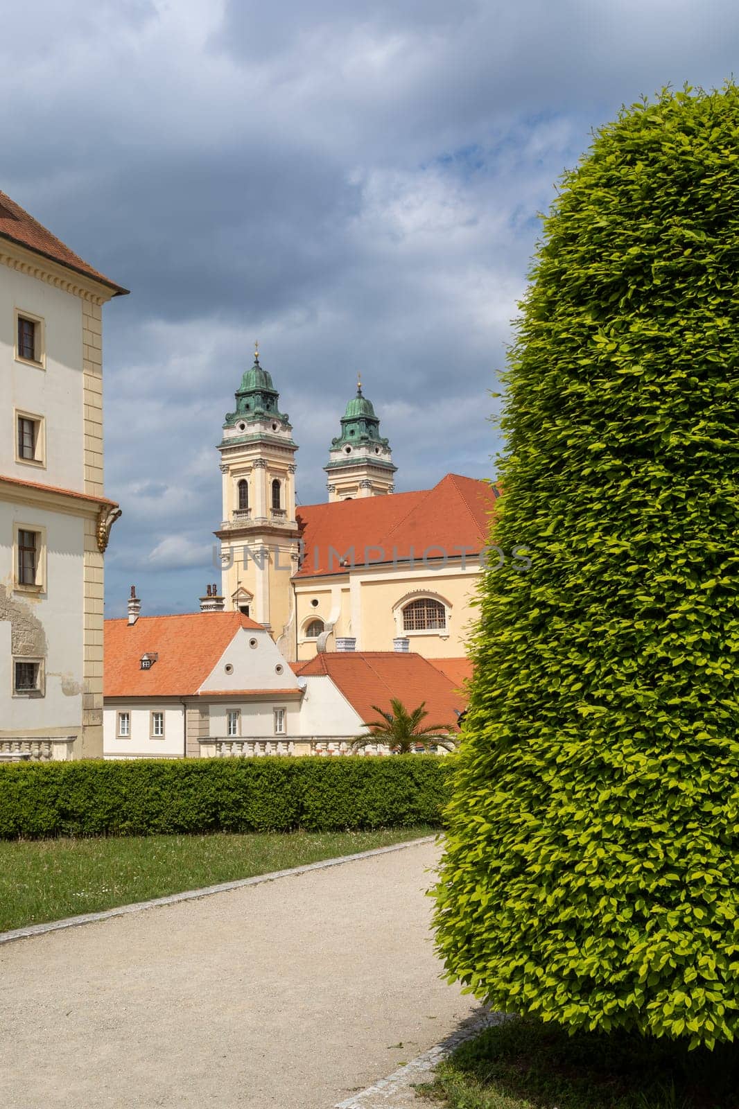 Baroque church of the Assumption of the Virgin Mary at Freedom Square at sunny summer day, UNESCO world heritage, popular travel destination