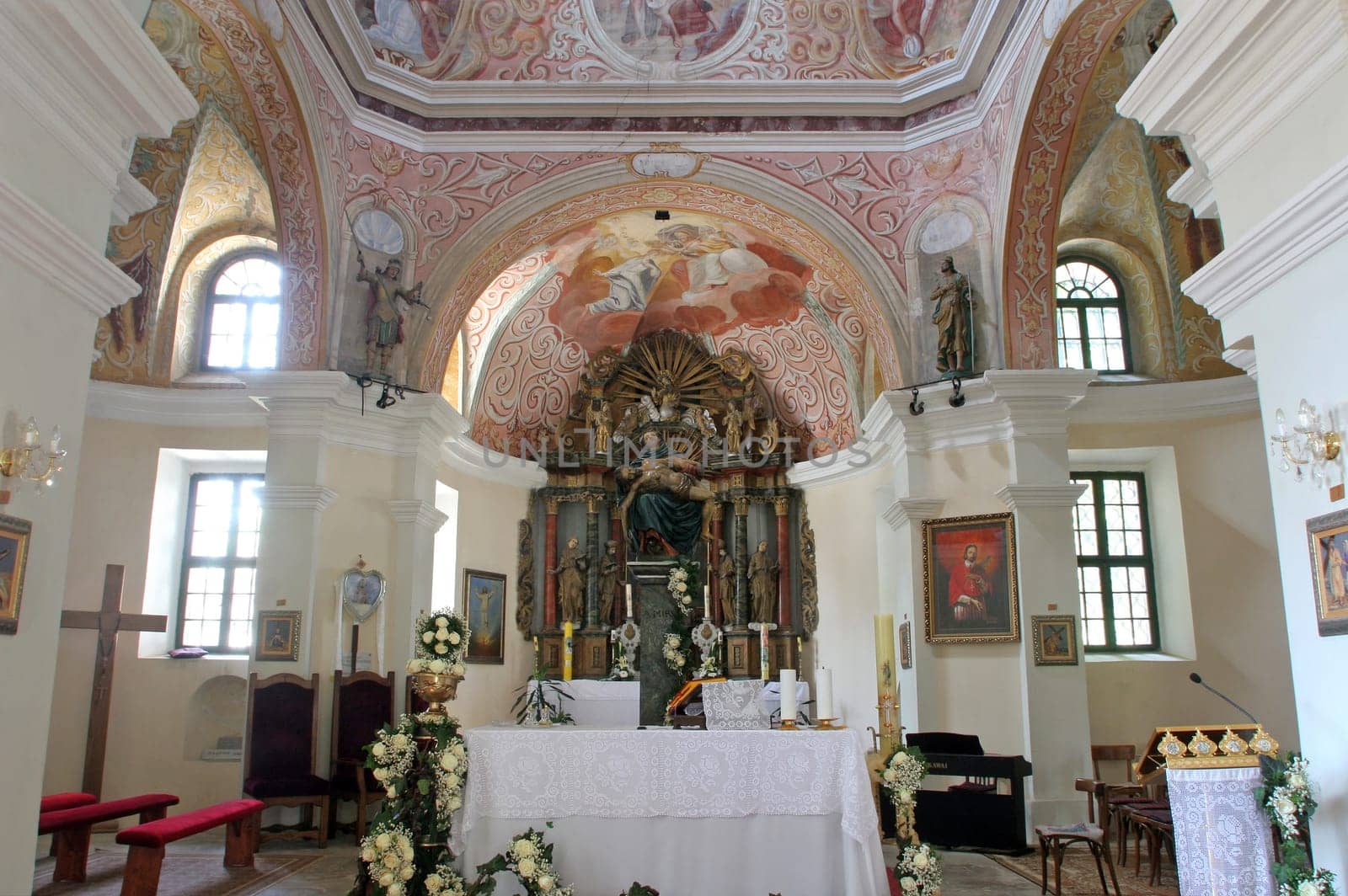 The main altar in the parish church of Our Lady of Sorrows of Carinthia in Krizevci, Croatia