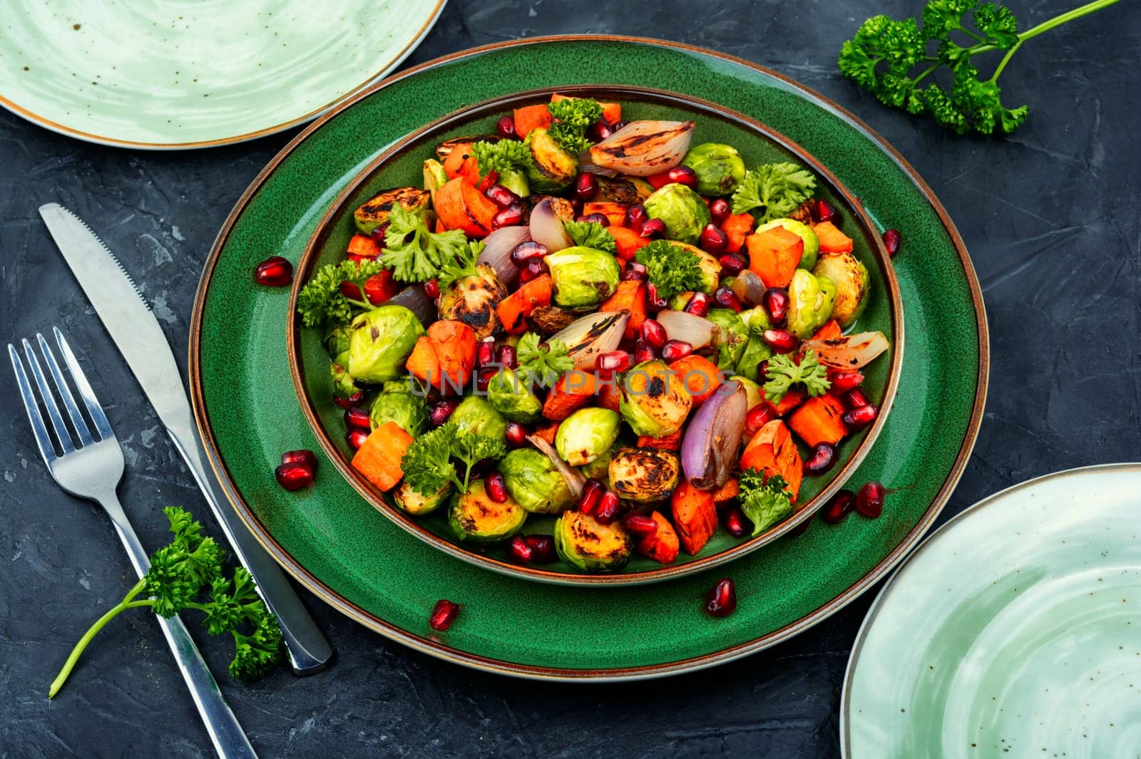 Bright dietary vegetable salad of cabbage, herbs and physalis. Healthy eating