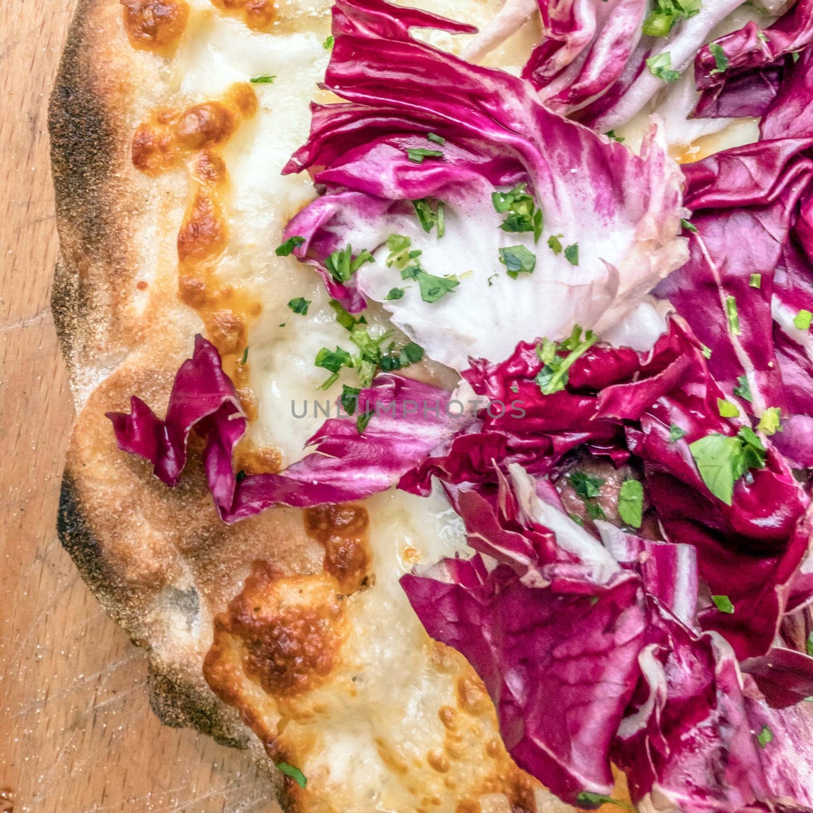 Neapolitan pizza with mozzarella and radicchio. Classic Italian recipe.