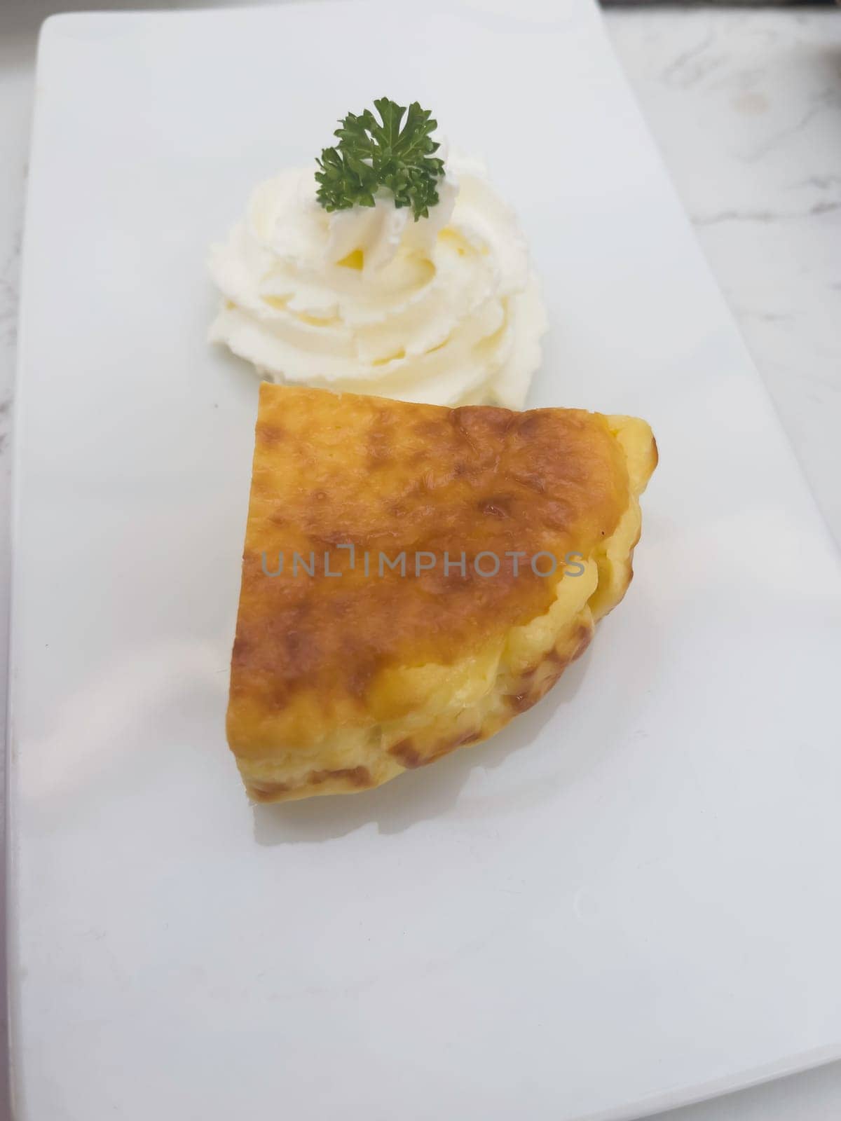 A piece of cheese cake, stock photo
