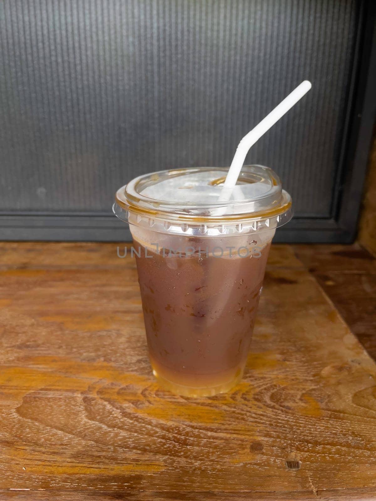 A glass of iced black orange coffee, stock photo