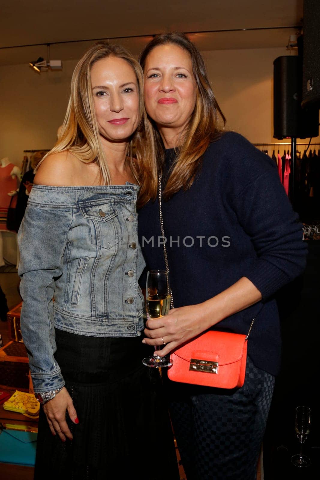 Kathrin Bruss (owner) and Dana Schweiger at Petra Teufel Fashion Night 2015
