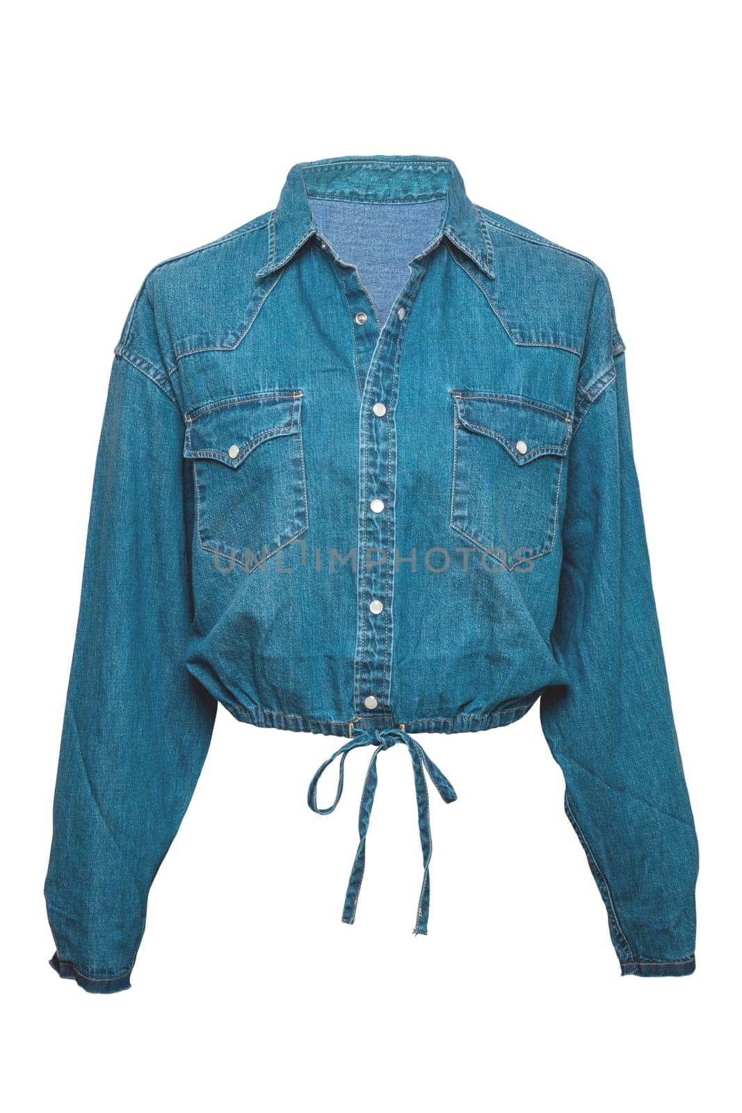 Jeans jacket isolated. Beautiful female stylish fashionable denim short blue jacket on mannequin. Clipping path. Jeans shirt with pockets.
