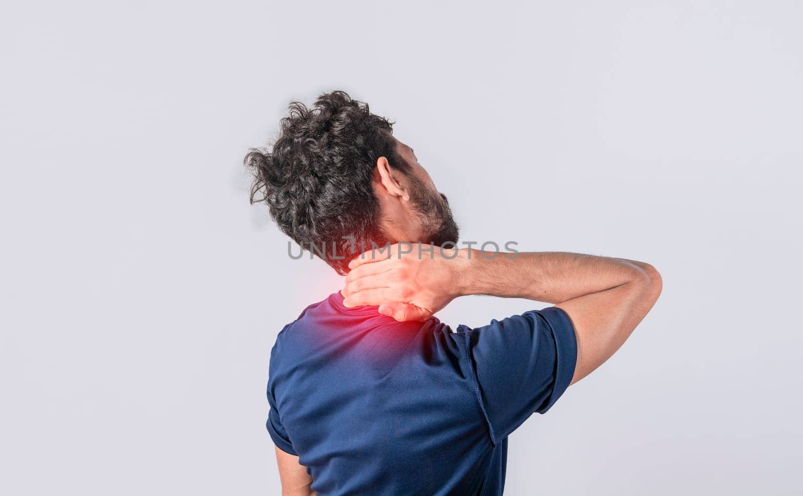 Close up of man with neck pain, a man with neck pain on isolated background, neck pain and stress concept, man with muscle pain