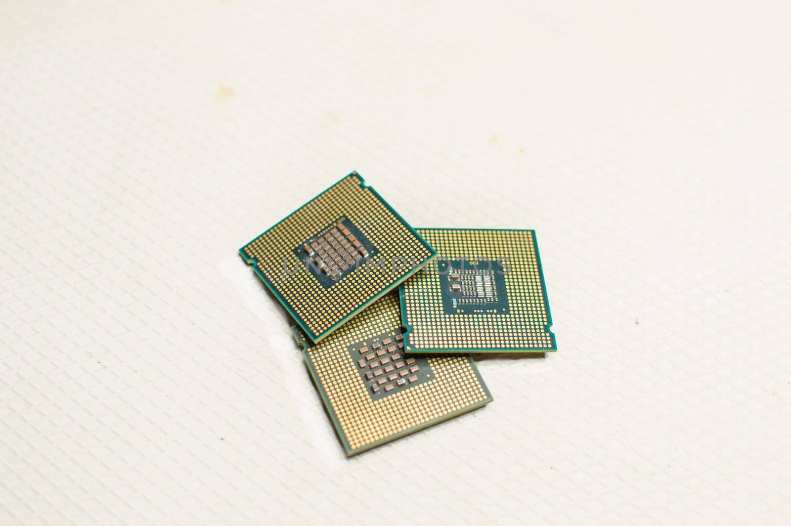 isolated computer microprocessors, three computer processors with one computer motherboard, computer processor concept