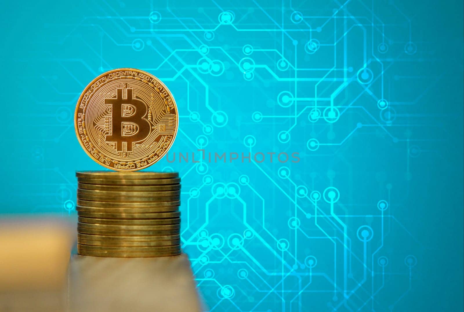 Bitcoin coins with blue background, one gold bitcoin on blue background