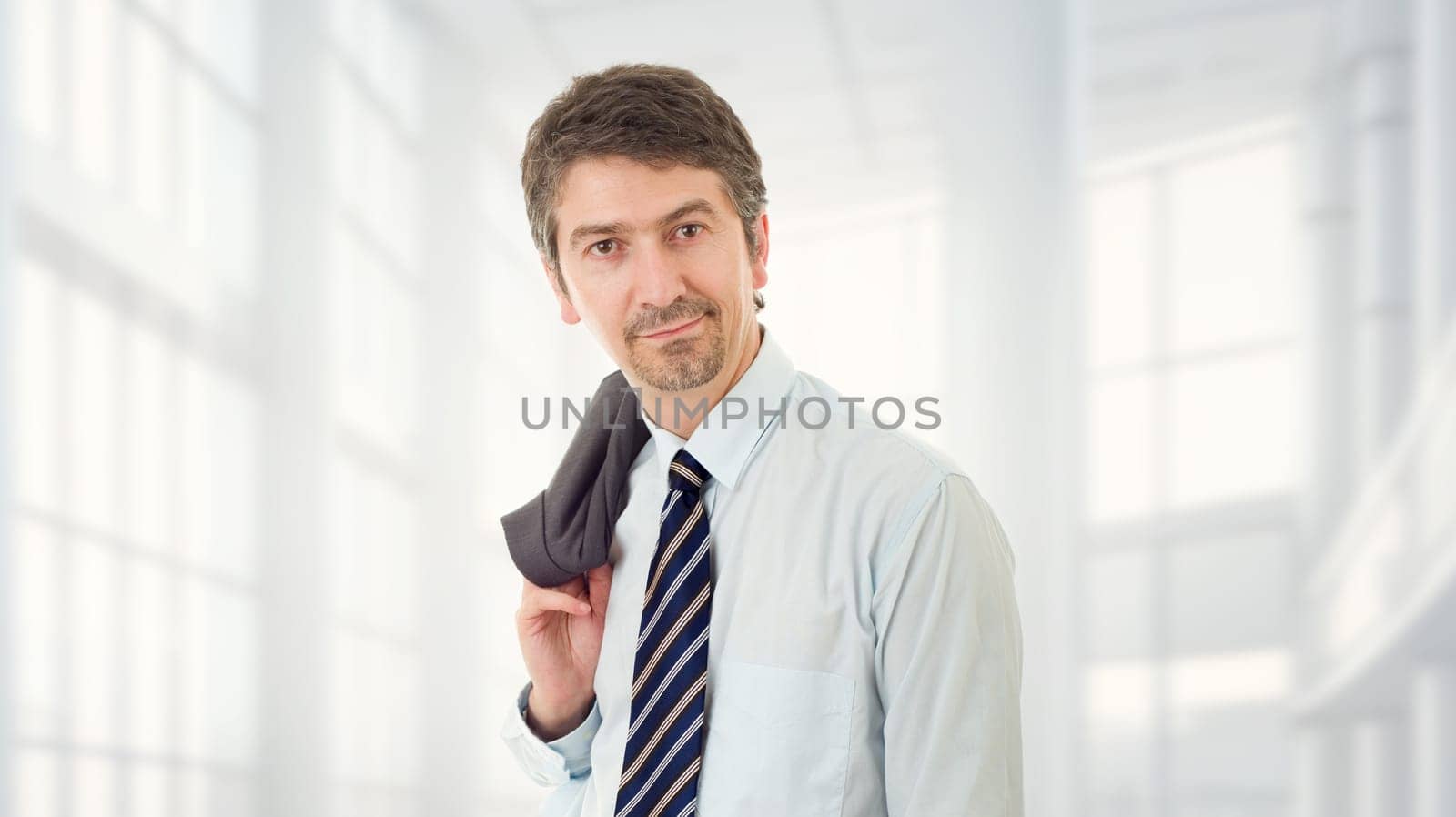young business man portrait at the office