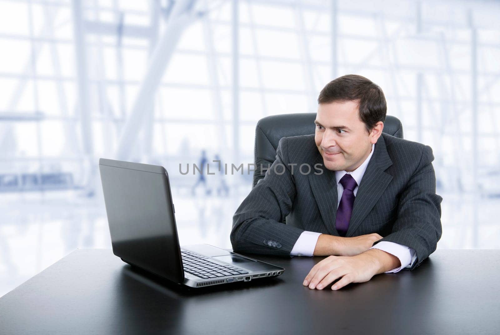 business man working with is laptop, at the office