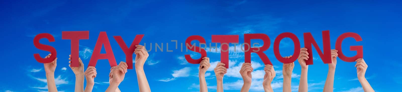 People Or Persons Hands Building English Word Stay Strong. Summer Ocean, Sea And Beach As Background.