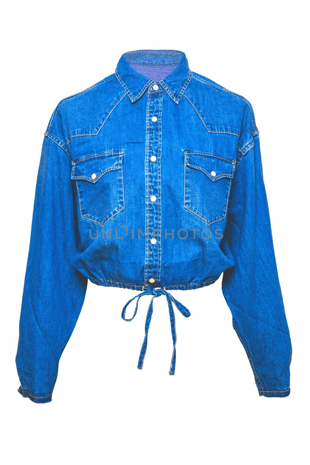 Jeans jacket isolated. Beautiful female stylish fashionable denim short blue jacket on mannequin. Clipping path. Jeans shirt with pockets.
