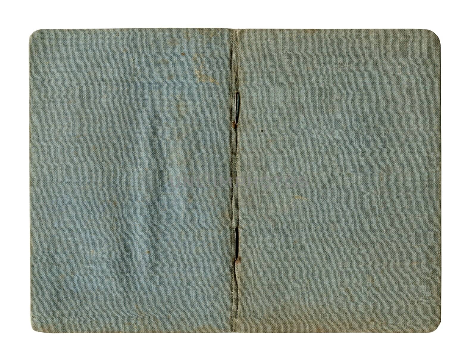front view closeup detail of small old open notebook vintage blue cover with stained and wrinkled buckram canvas cloth isolated on white