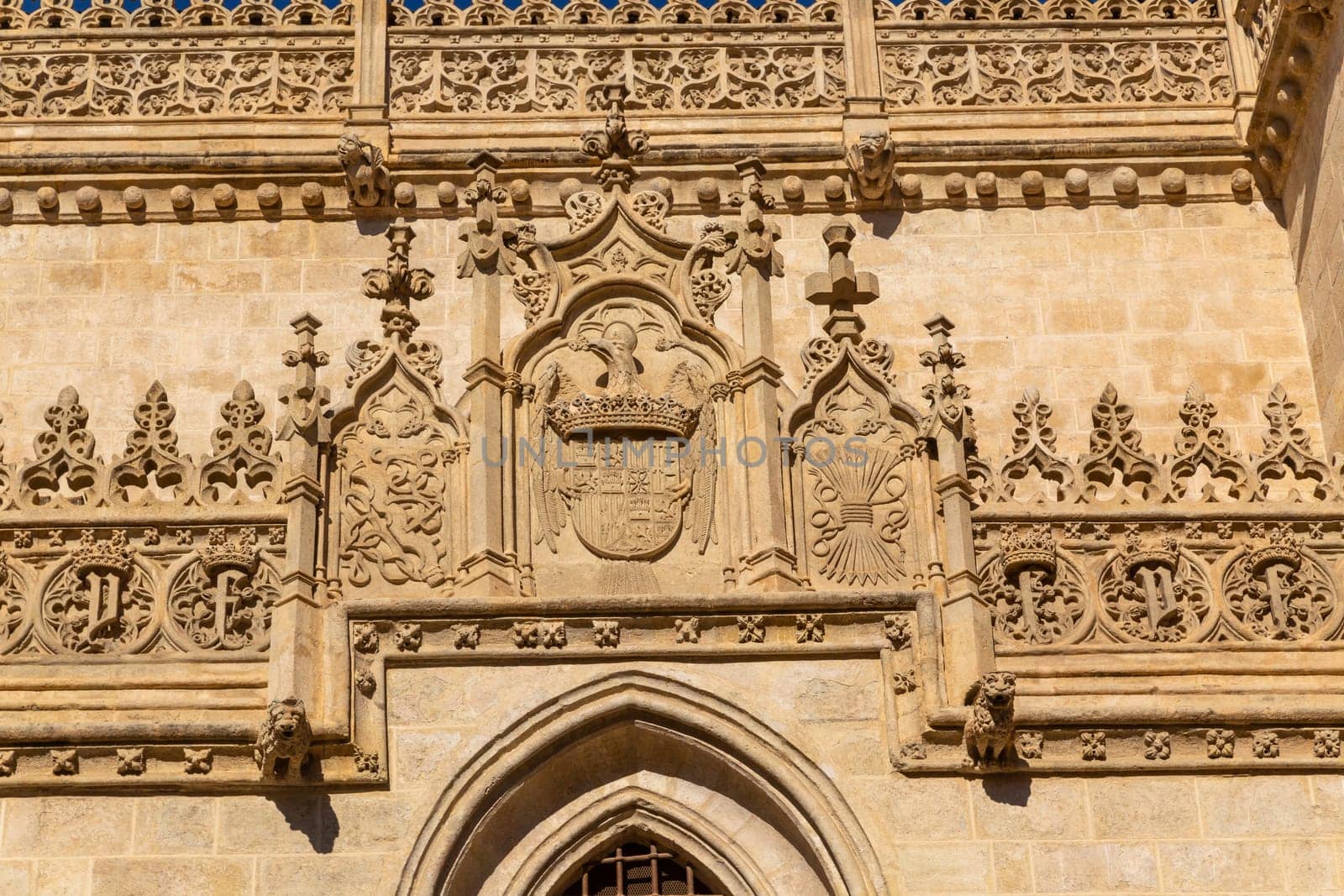 Gothic Crest in the renaissance facade of access to the royal chapel Granada Andalusia Spain