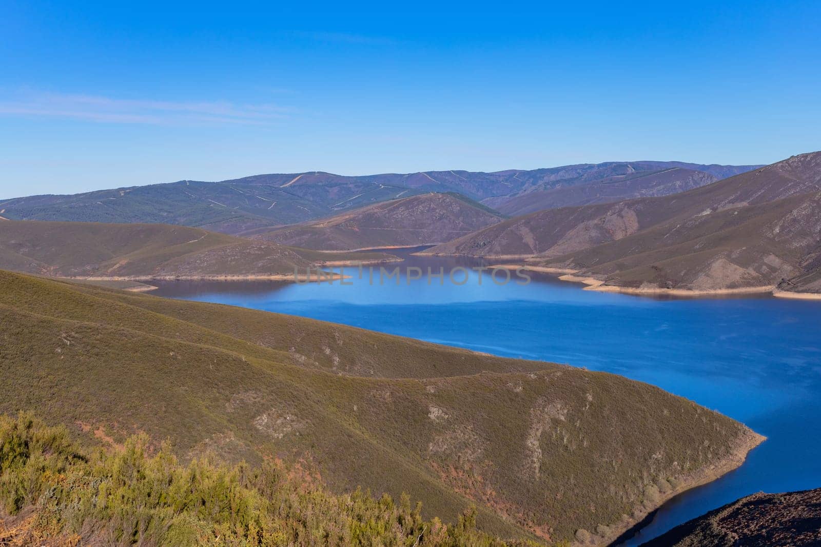 Mountain landscape with a lake, mountains near Puebla de Sanabria, Zamora, Spain