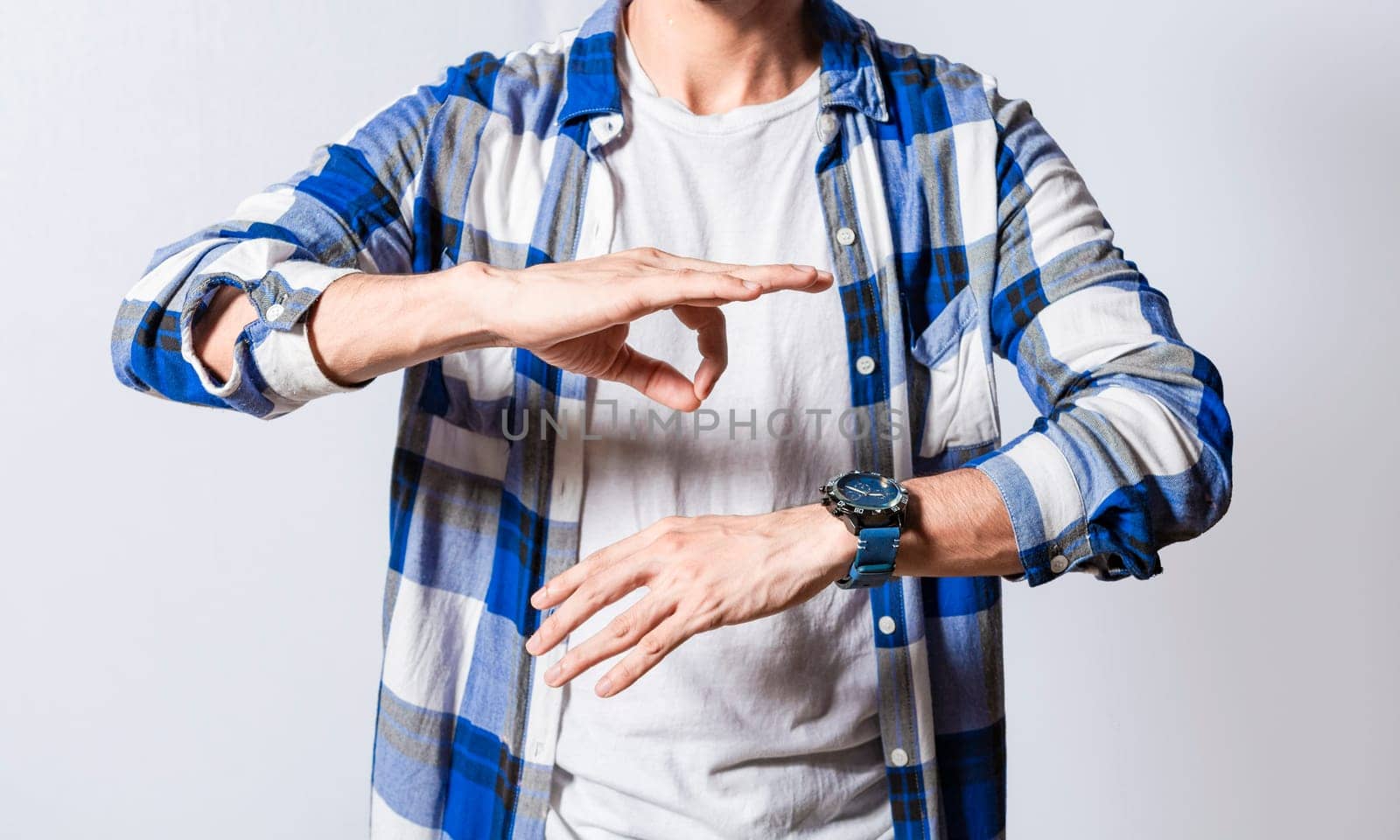 Person speaking in sign language isolated. Young man gesturing in sign language, People who speak in sign language. Manual gestures of people with hearing problems