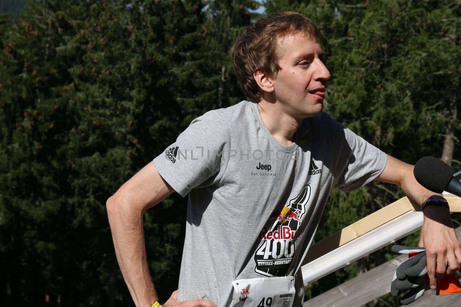 Men's winner Christian Riedl was a sought-after interview partner at the Red Bull 400 - Germany premiere Titisee-Neustadt