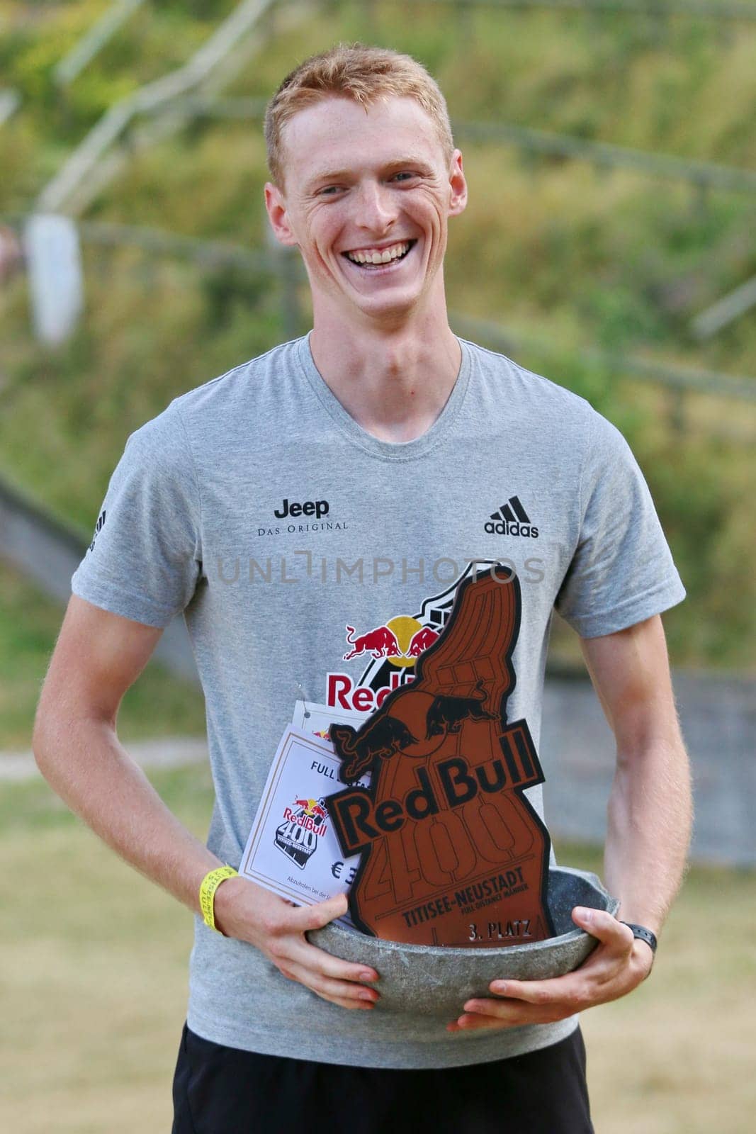 Bastian Glöden has a good laugh and is happy about third place at the Red Bull 400 - Germany premiere Titisee-Neustadt