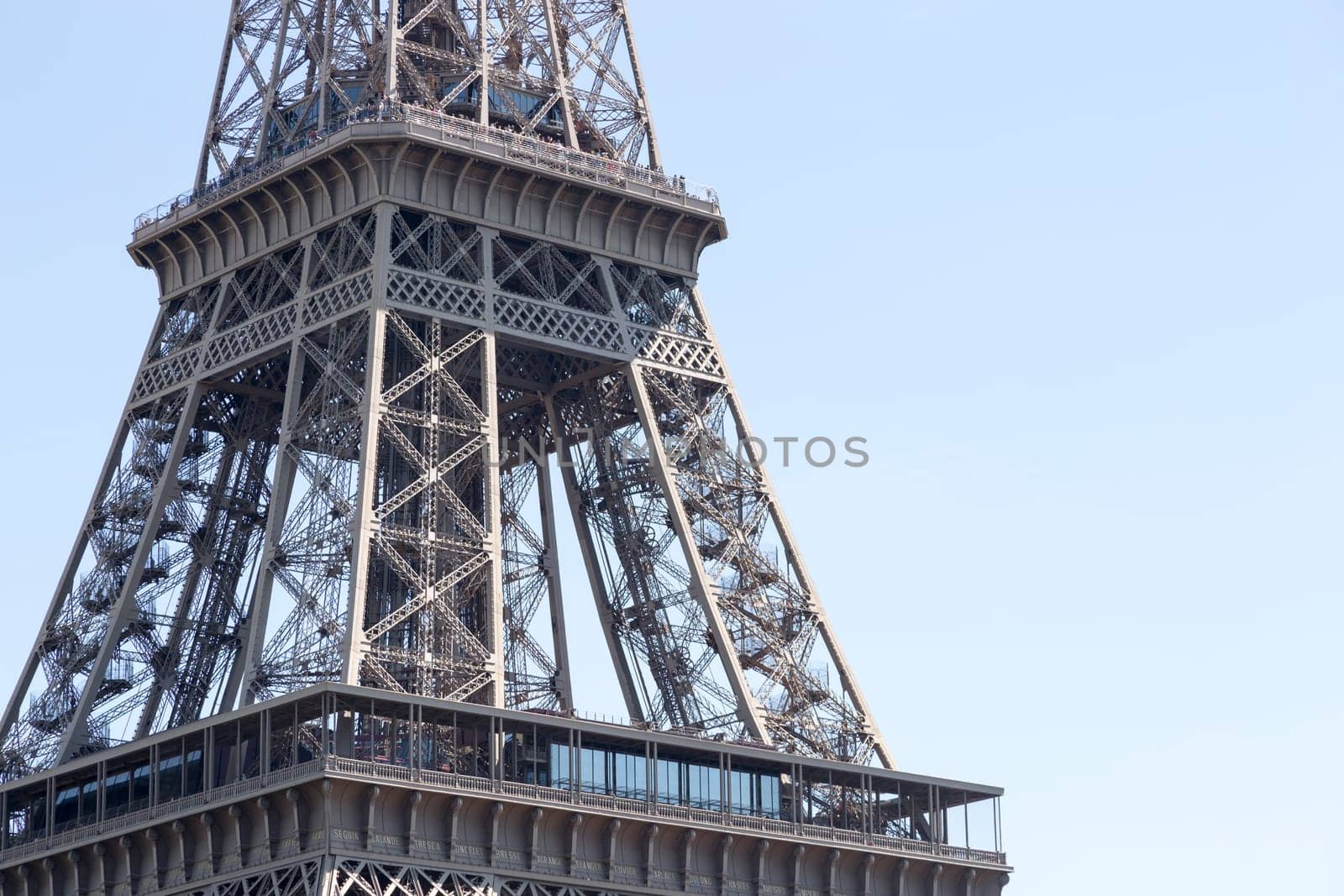 The Eiffel Tower in Paris, France close up.