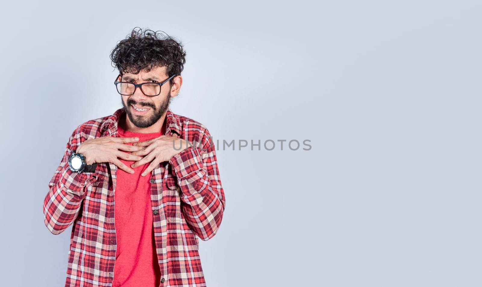 People with disgust face isolated. Handsome man with disgust expression, isolated background, Person with cringe expression with hands on his chest