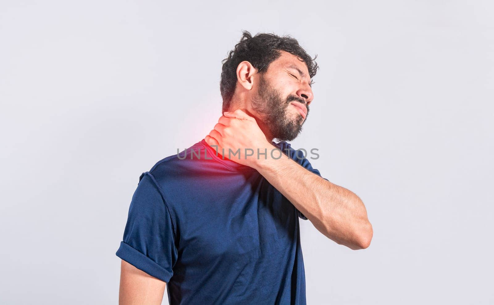 Neck pain and stress concept, man with neck muscle pain, Close up of man with neck pain, a man with neck pain on isolated background.