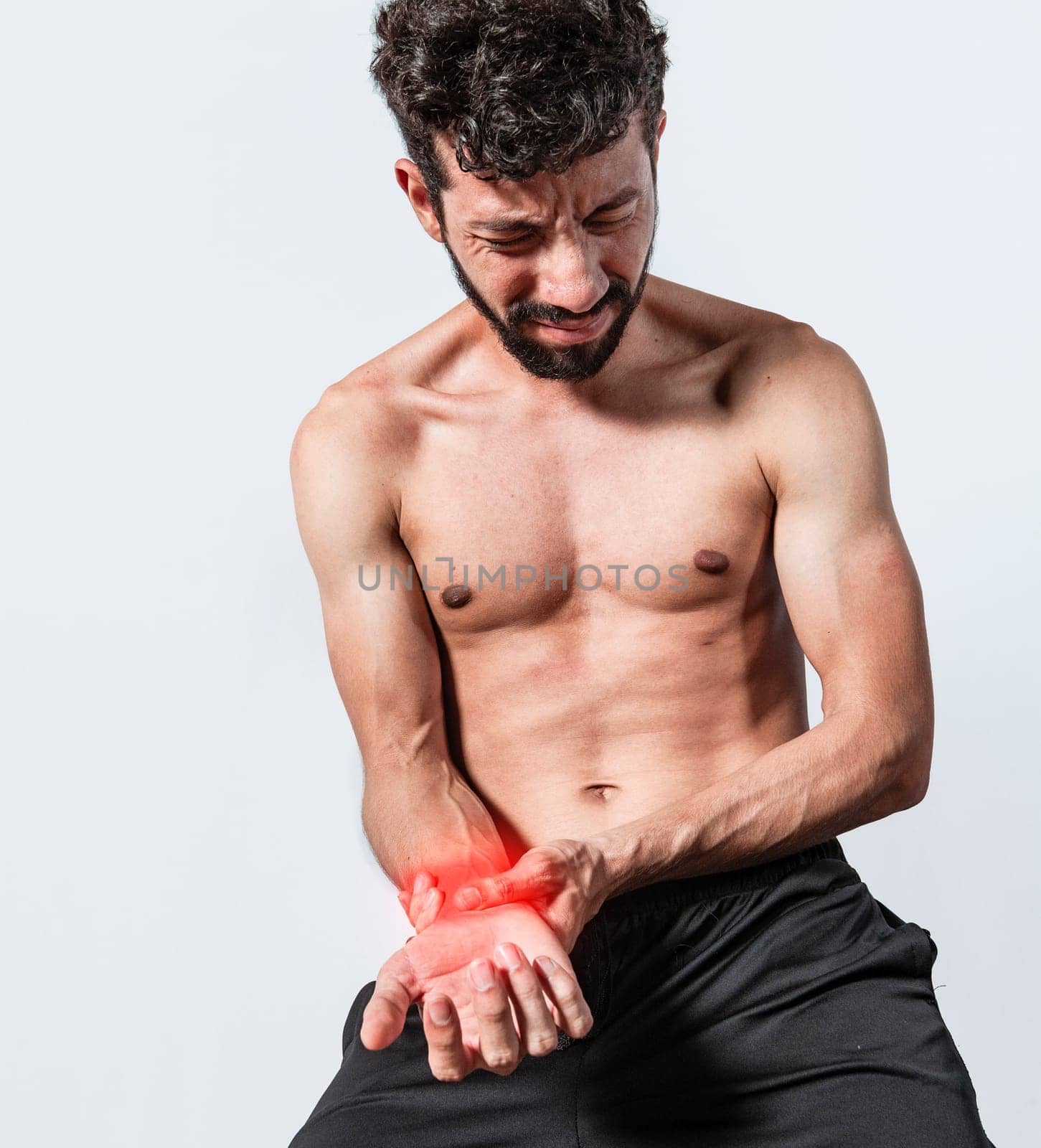 Person with wrist pain isolated, concept of man with pain in the hands, man with arthritis rubbing, person with pain in the wrist, Concept of arthritis in the wrist