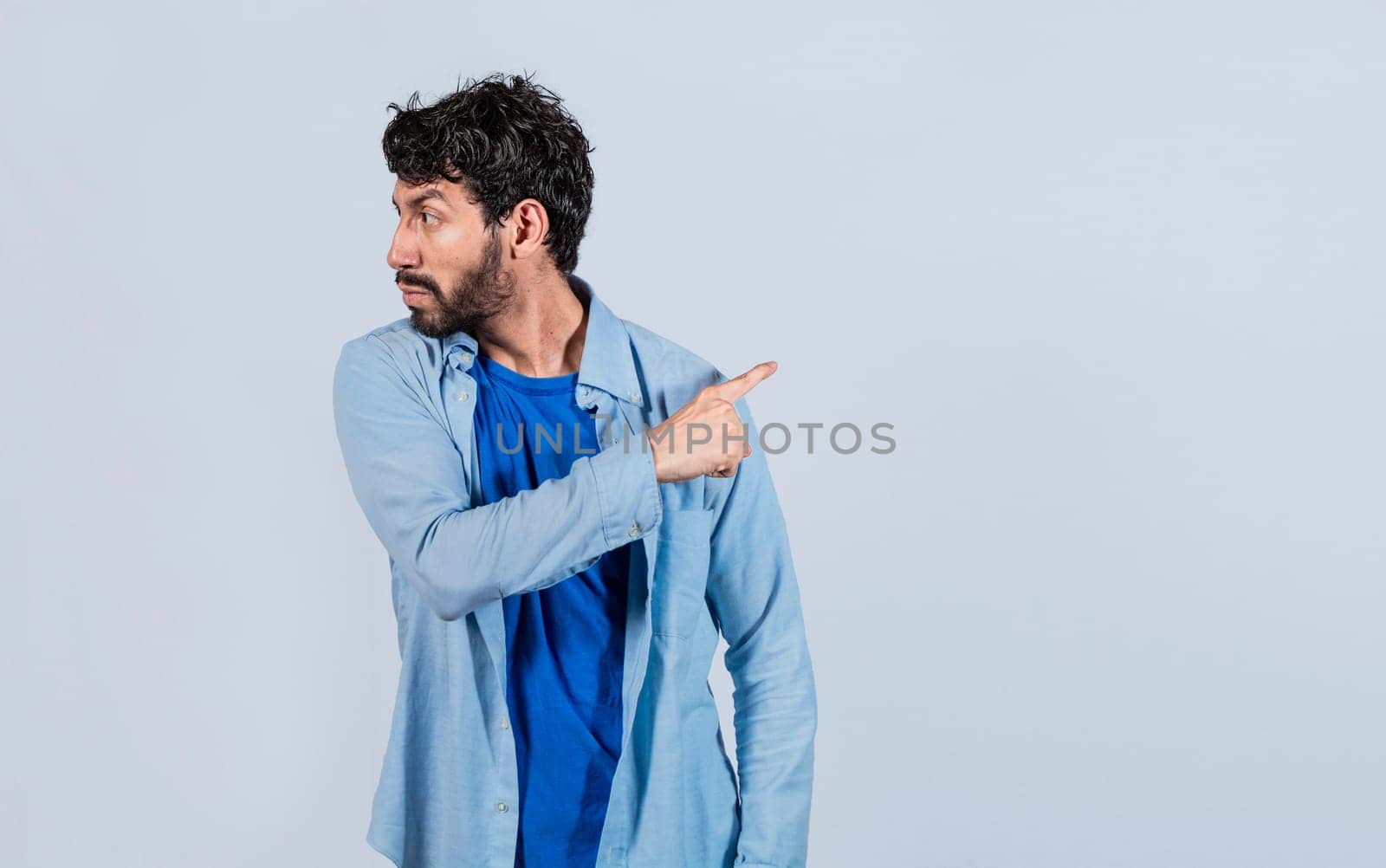 angry man pointing to get out, angry person pointing to get out, Get out, annoyed bearded man looking to the side and pointing finger