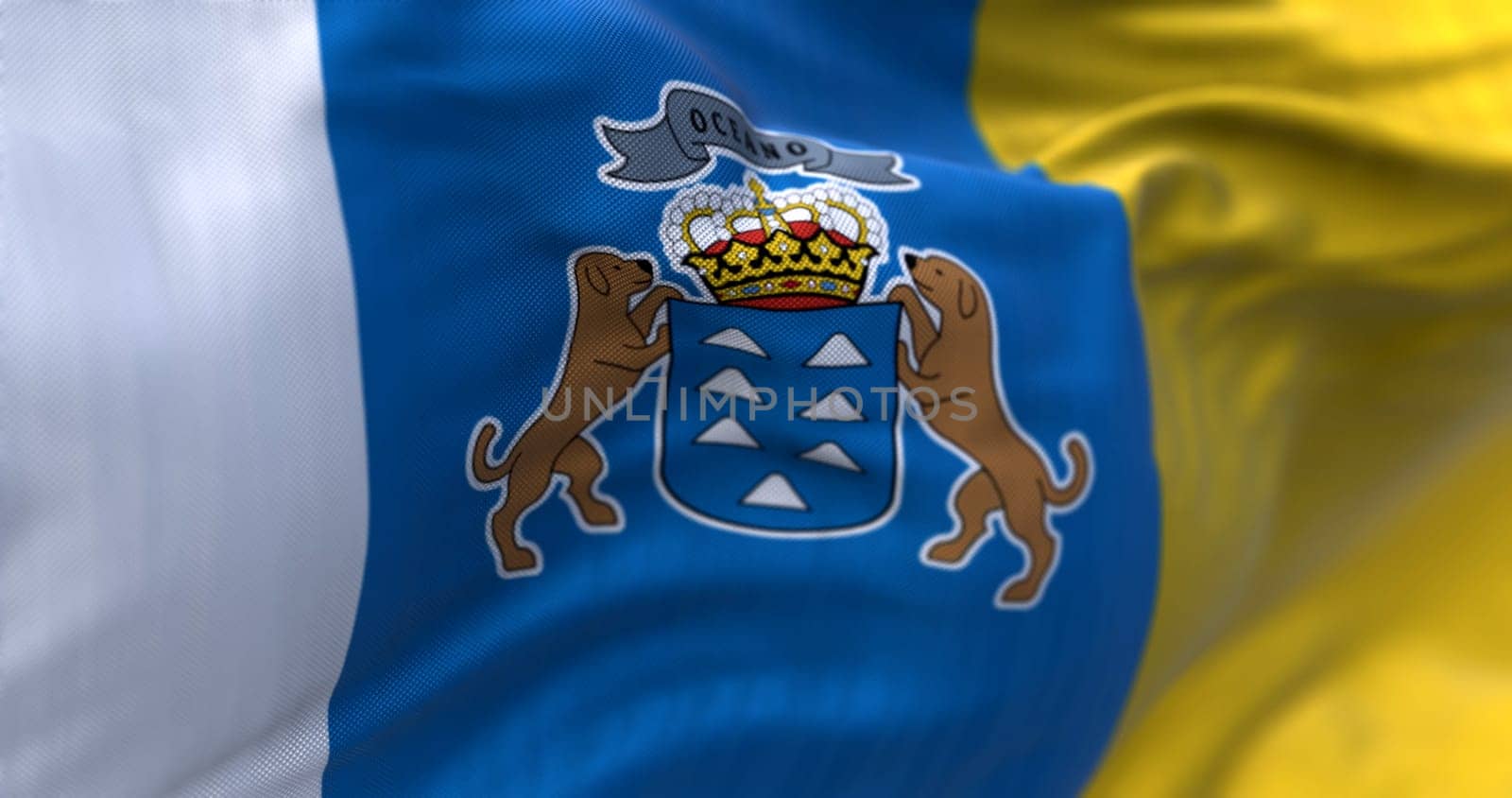 Detail of Canary Islands flag waving in the wind. the Canaries are a Spanish autonomous community. 3d illustration render. Selective focus. Close-up. Rippled textile