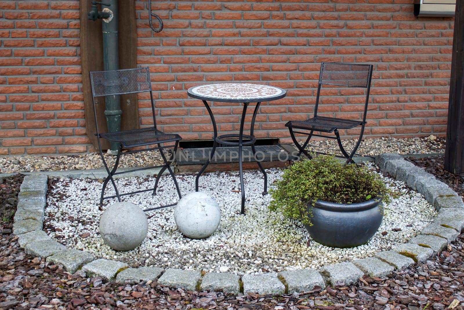 rustic garden - table with chairs in a garden