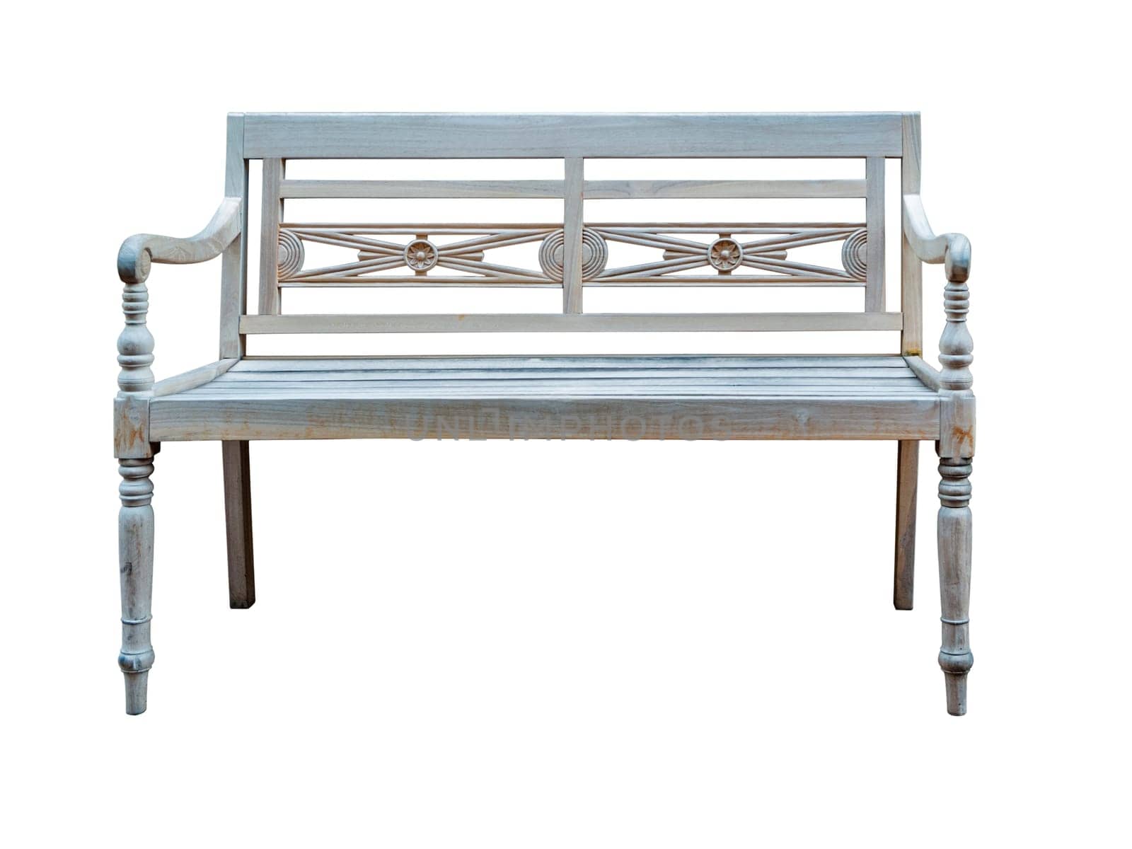 Frontal view of a lightly whitewashed wooden garden bench with an ornate backrest isolated on white.
