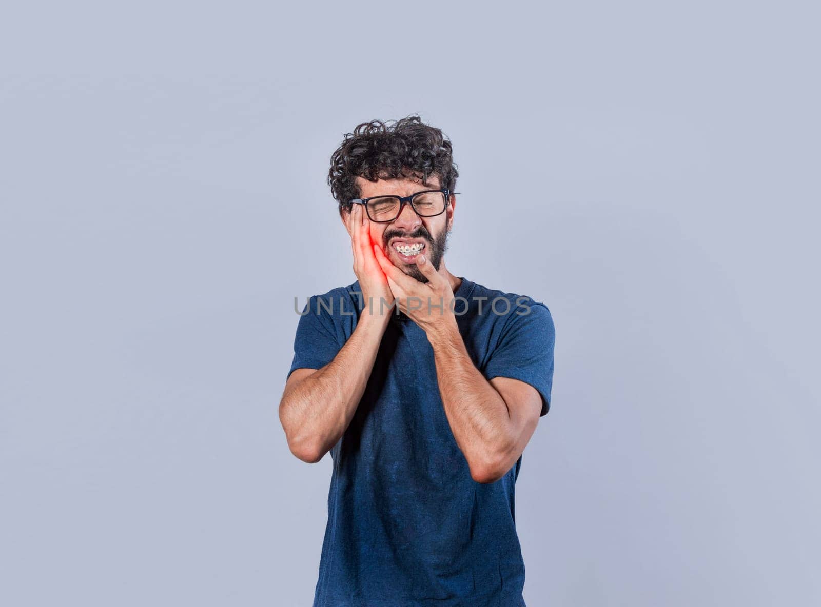 Person with pulpitis or toothache problem, Concept of people rubbing cheek with toothache, Handsome man with toothache isolated.