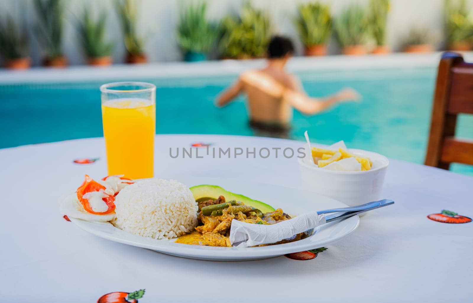 Traditional breakfast served poolside. Traditional morning breakfast near the swimming pool