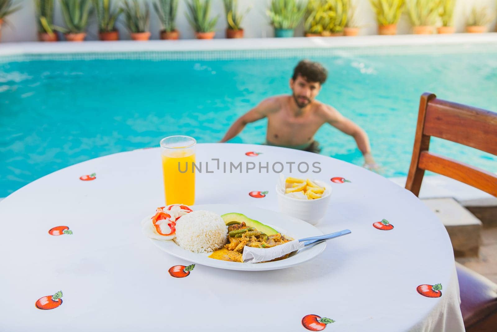 Traditional morning breakfast near the swimming pool, Traditional breakfast served poolside