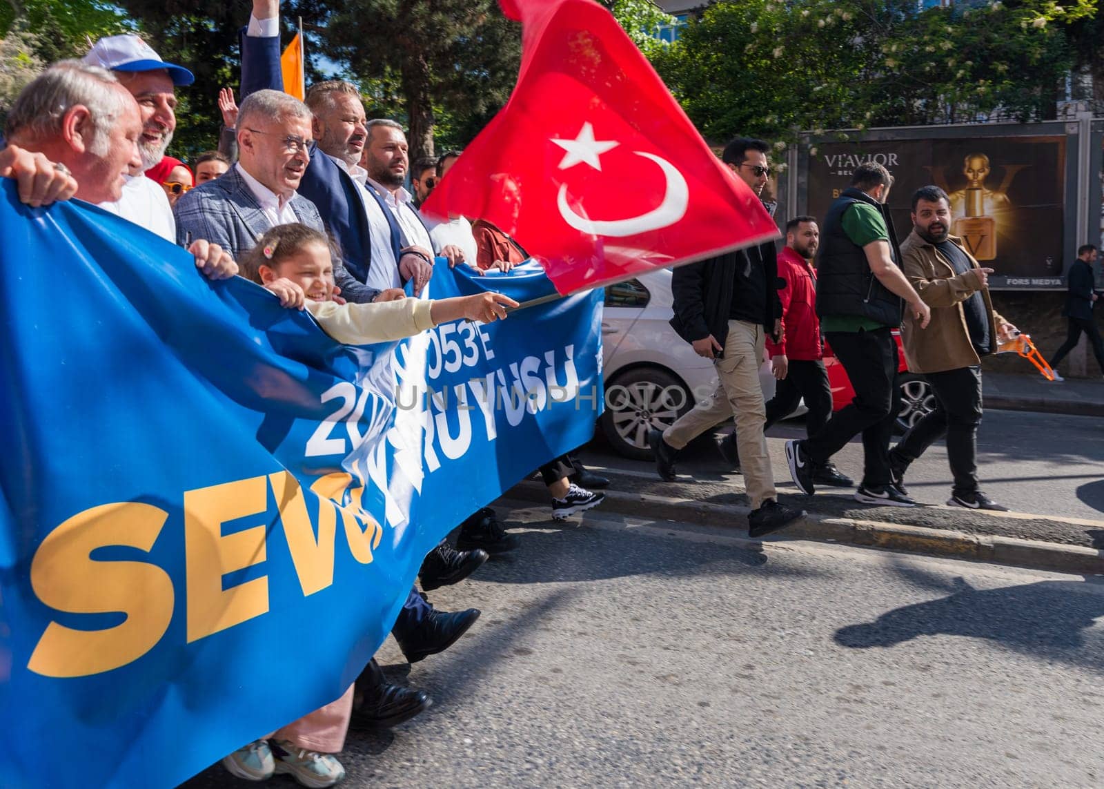 Istanbul, Turkey - May 13 2023: Street march of AK Party in Cumhuriyet street, Uskudar neighbourhood during 2023 elections