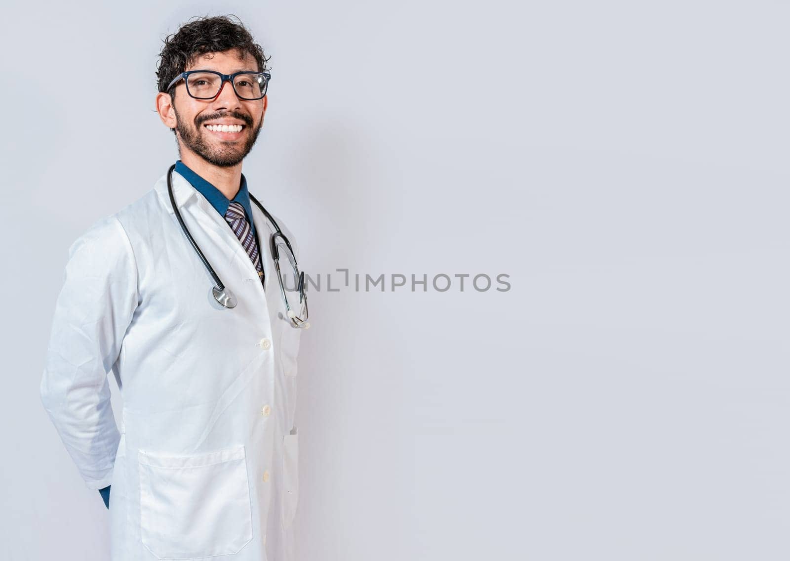 Portrait of happy doctor on isolated background. Happy latin doctor with copy space isolated