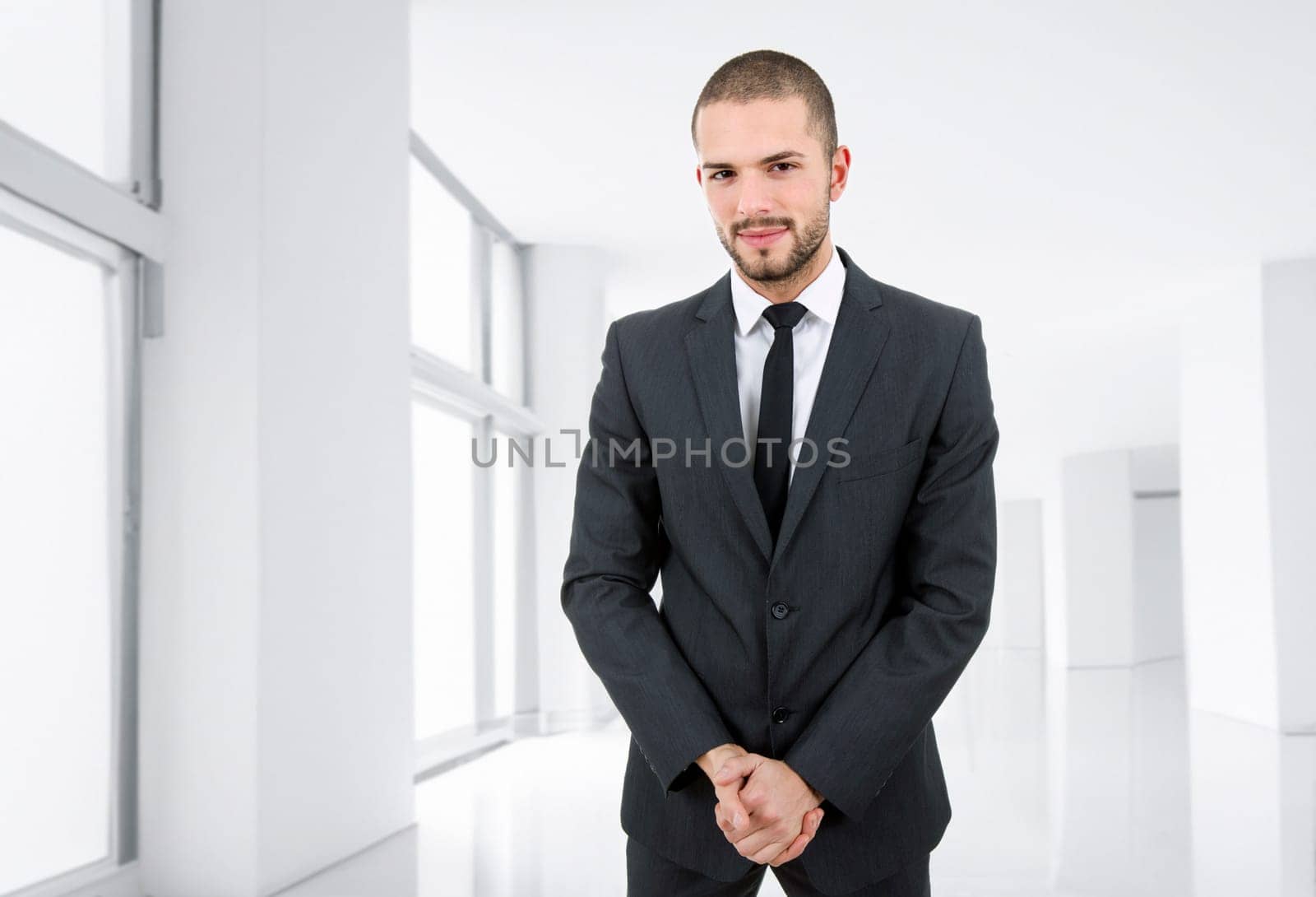 young business man portrait at the office
