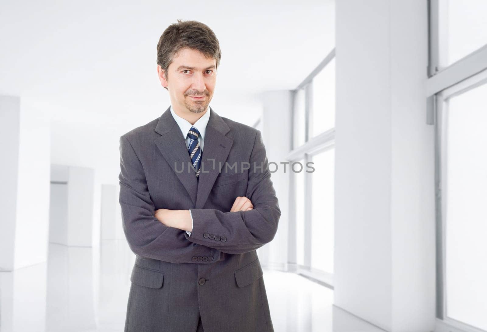 young business man portrait at the office
