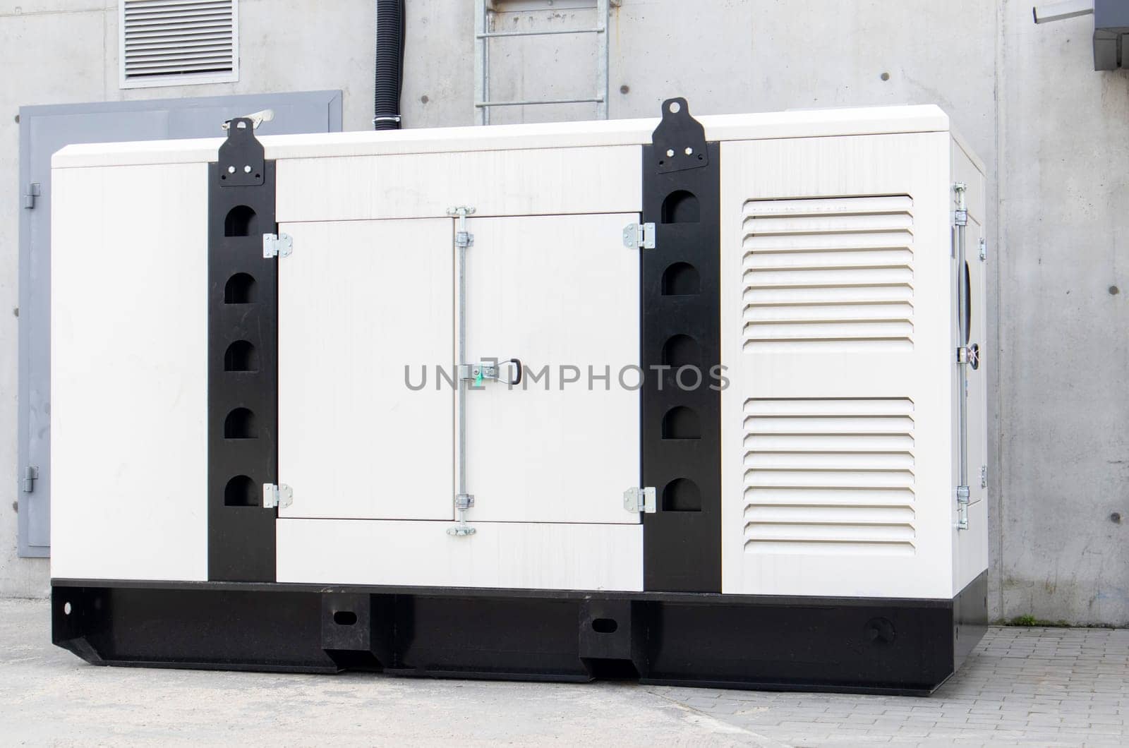 Mobile, standby industrial diesel generator for emergency power supply. Generator with internal combustion engine. For emergency use of electricity outdoors