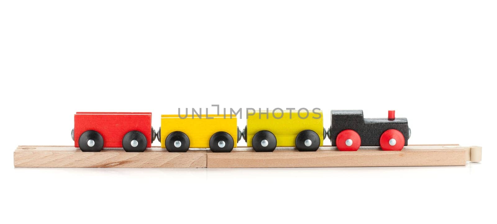Wooden toy train. Isolated on white background
