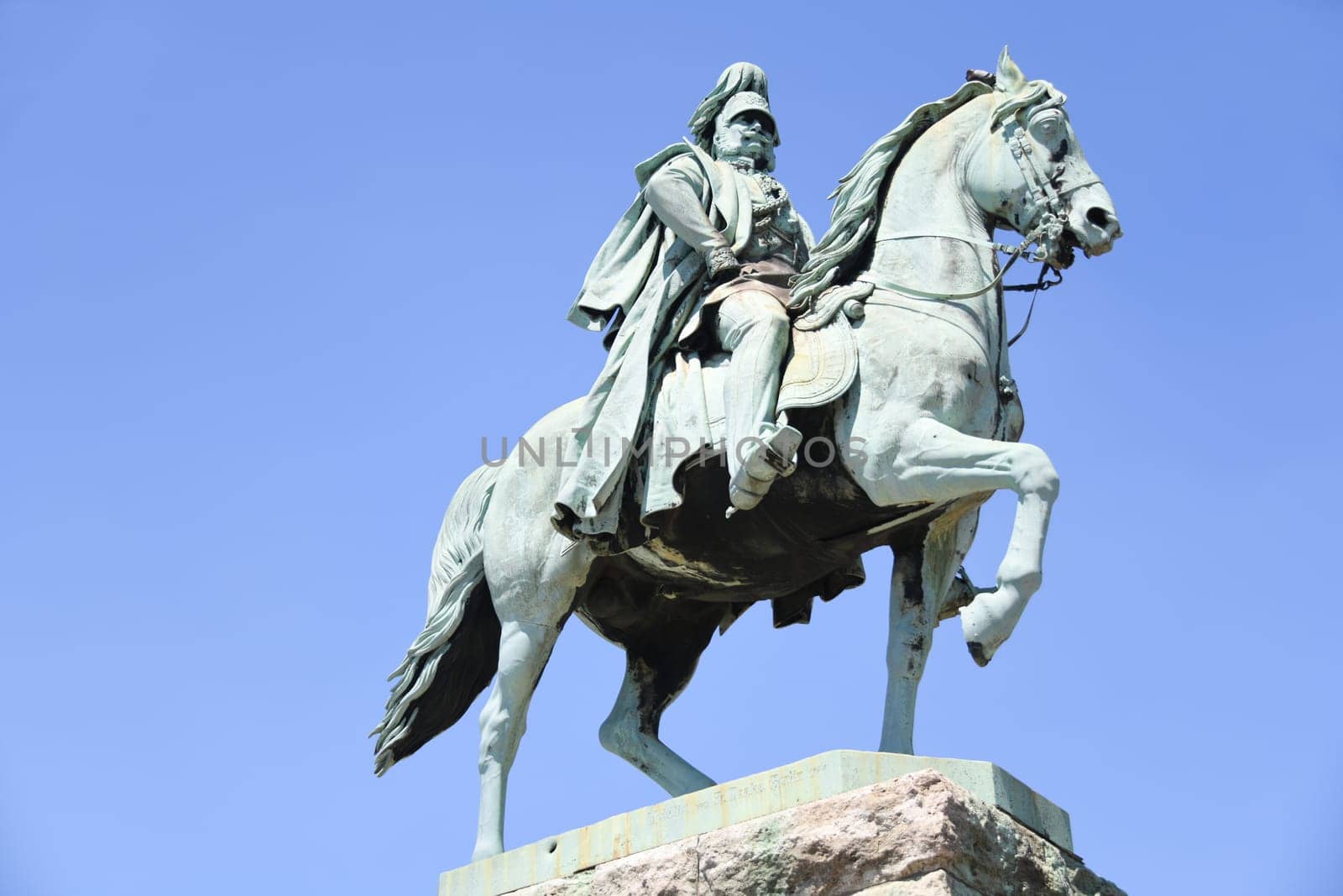 On the right bank of the Rhine near the Hohenzollern Bridge in Cologne stands the equestrian statue of Kaiser Wilhelm I (1797 - 1888). He became King of Prussia in 1861 and German Emperor in 1871. Created in 1864 by Friedrich Drake