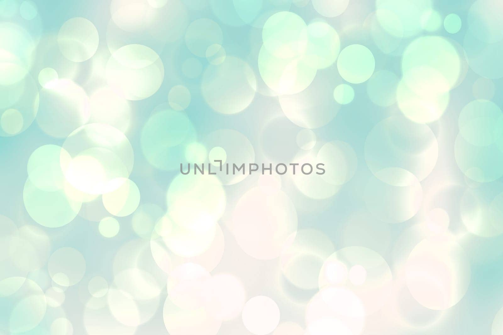 Abstract light green and white delicate colorful pastel spring or summer bokeh background with glittering stars and space. Beautiful modern graphic design texture.