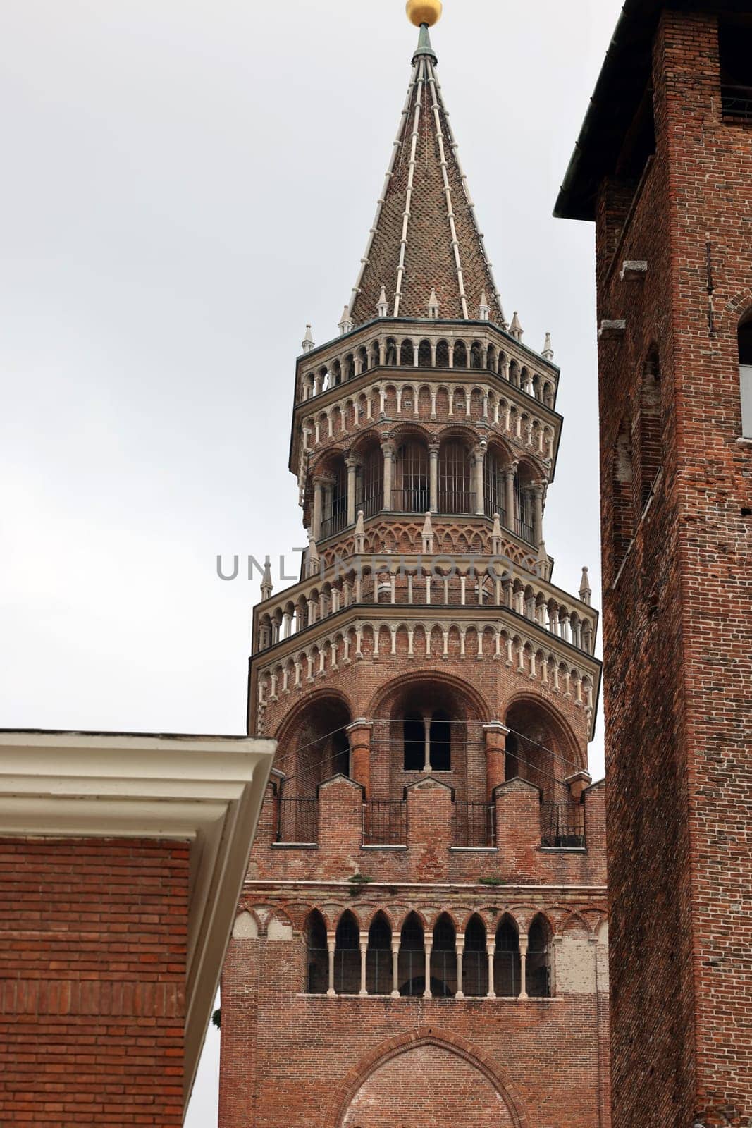 the Medieval Bell Tower of Cremona known as the Torrazzo, Lombardy, Italy.