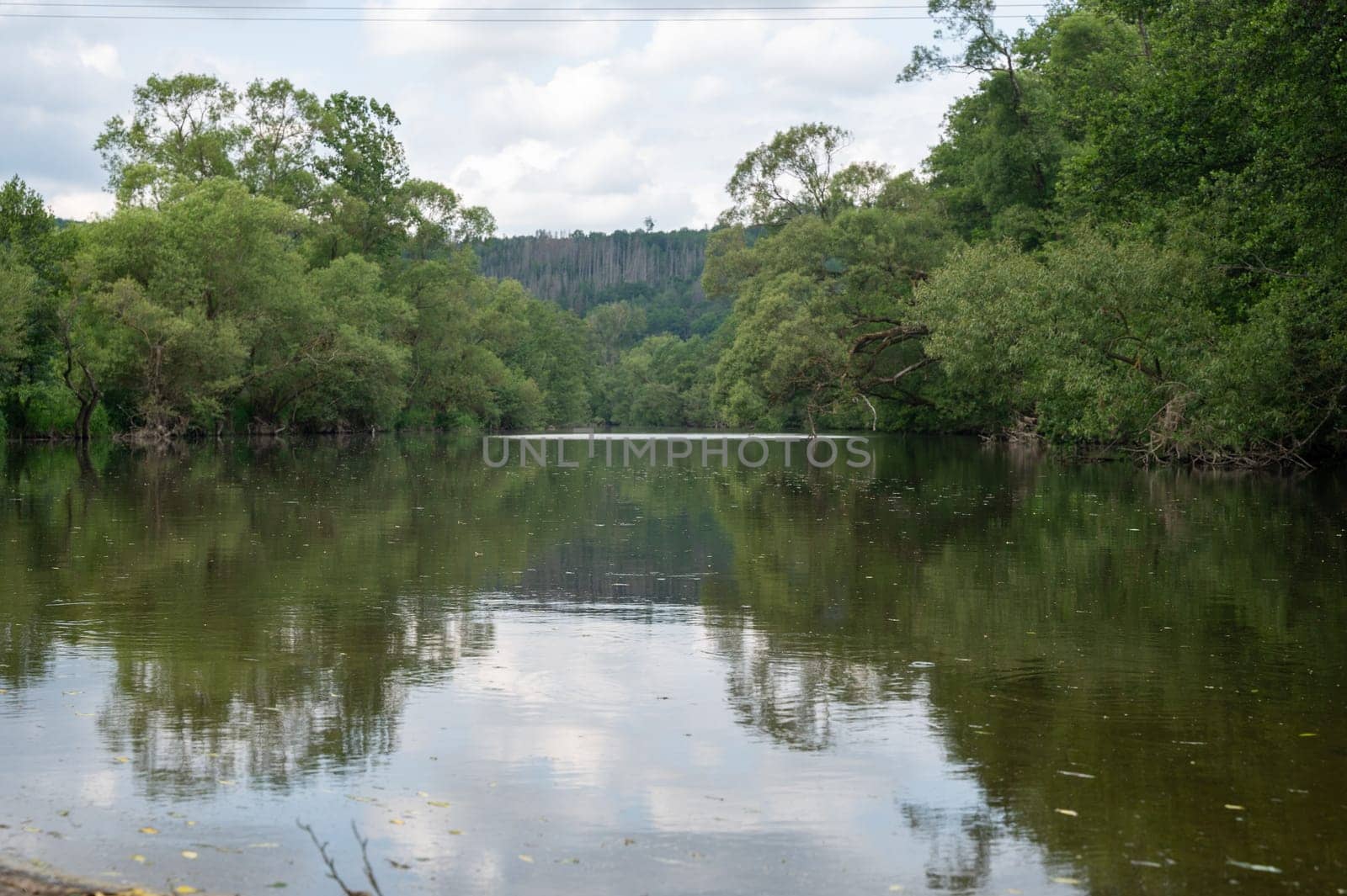 The Eder - A river in Germany in a green landscape