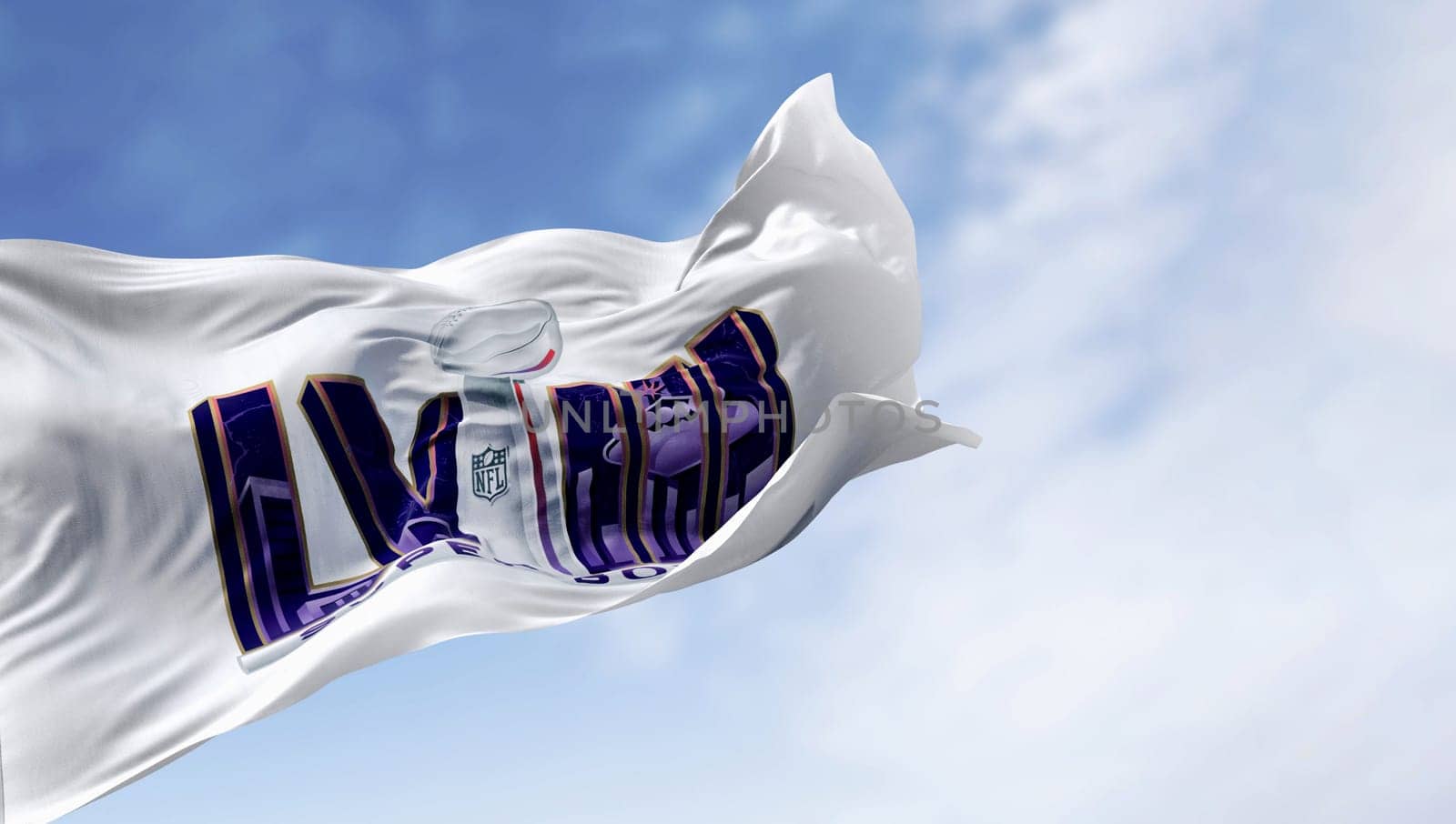 Paradise, US, June 28 2023: 58th Super Bowl flag waving on a clear day. The game is scheduled to be played on Feb 11, 2024 in Paradise, Nevada. Illustrative editorial 3d illustration render