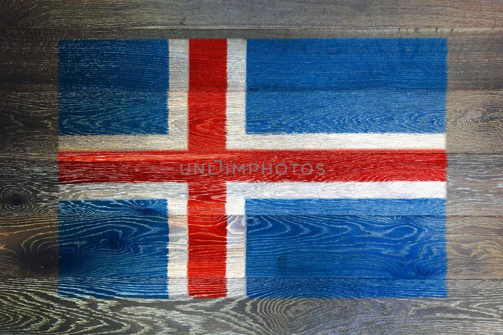 An Iceland flag on rustic old wood surface background