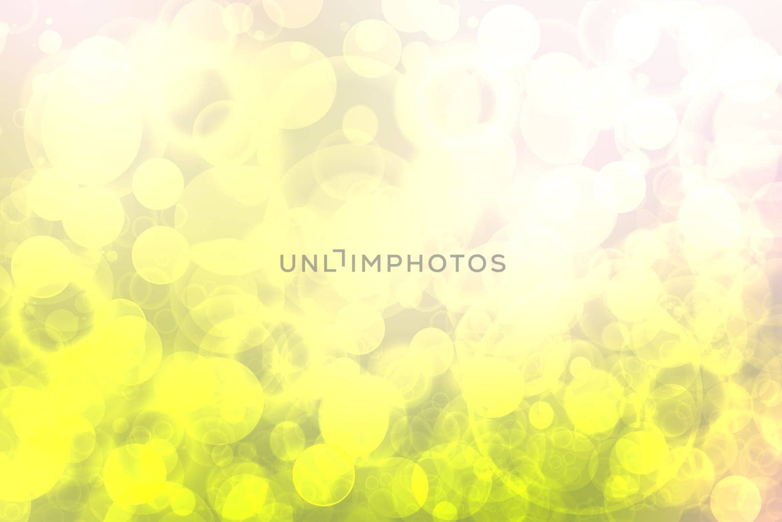 Abstract bright spring or summer landscape texture with natural green bokeh lights and yellow circular lights with sunshine and sun rays. Beautiful autumn background with copy space.