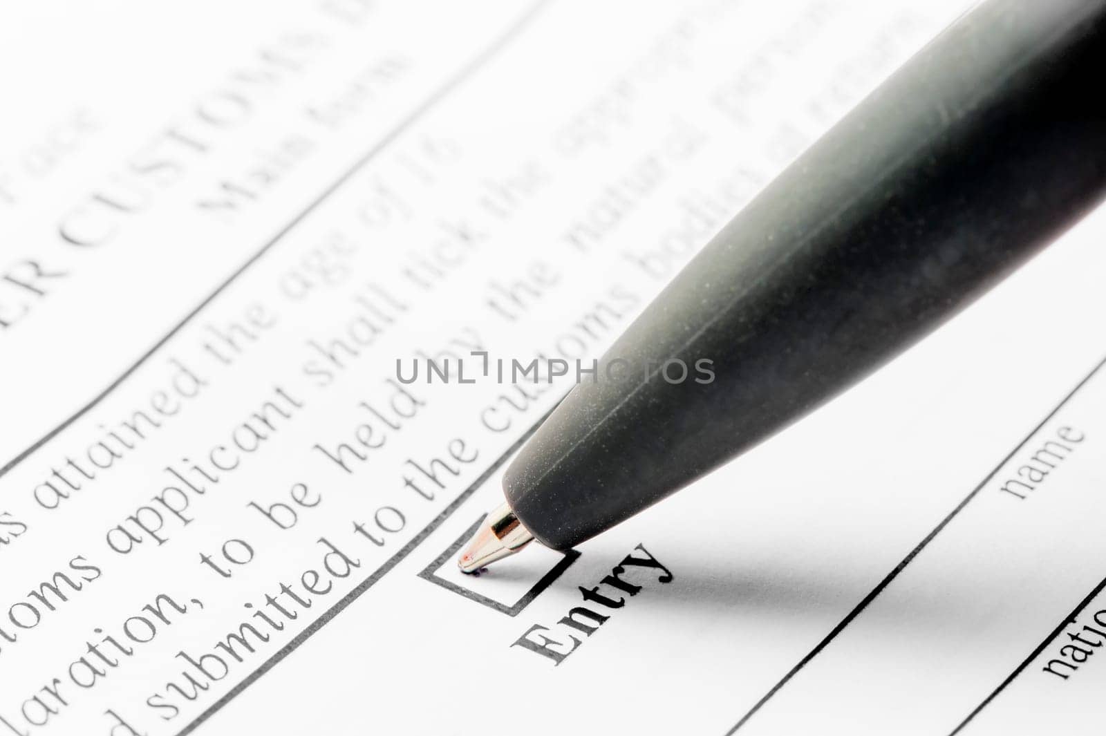 ballpoint pen and declaration form close-up