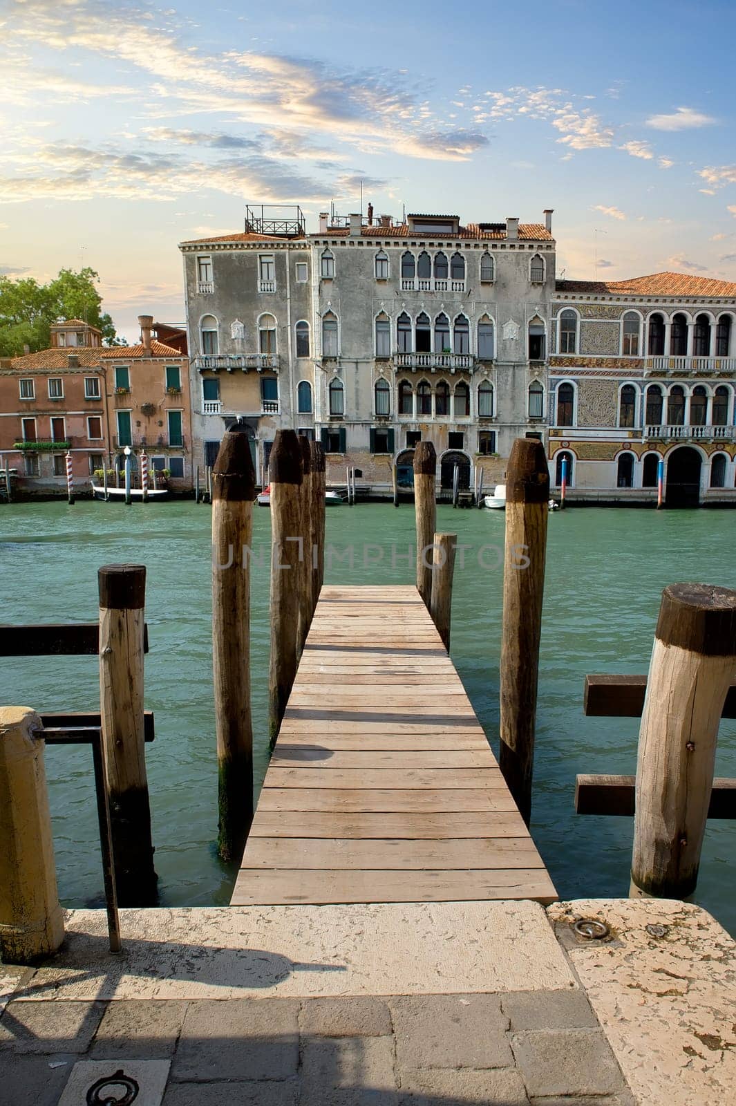 Small wooden jetty on Grand Canal in Venice