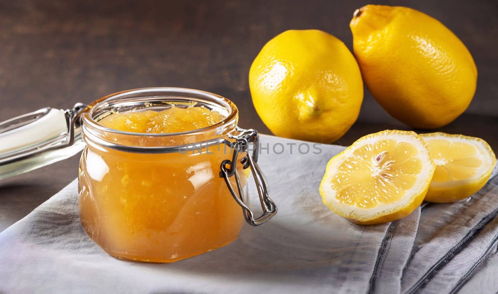 bowl of lemon's jam with fresh fruits on a wooden table