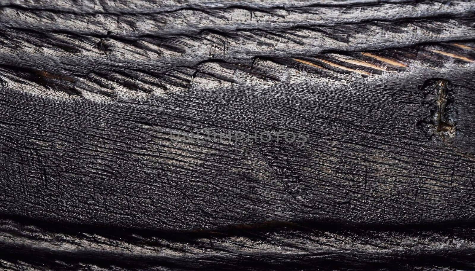 Dark wood texture background. Vintage old black boards hardwood. Charcoal timber quality high. Pattern wood grain material polished. Wooden floor detailed photo.